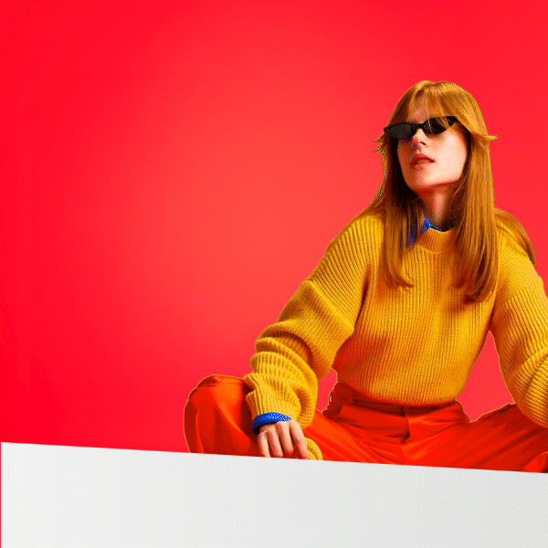 Gif of a woman with yellow jumper